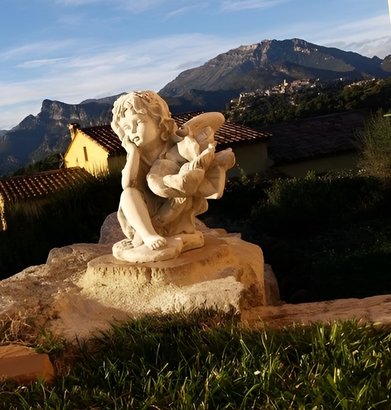 Statue de jardin en pierre Fée pensive